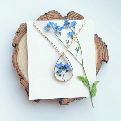 pressed forget me not flower resin necklace