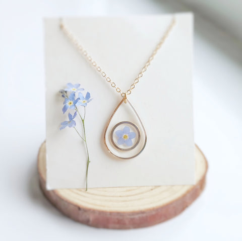 pressed forget me not flower resin necklace